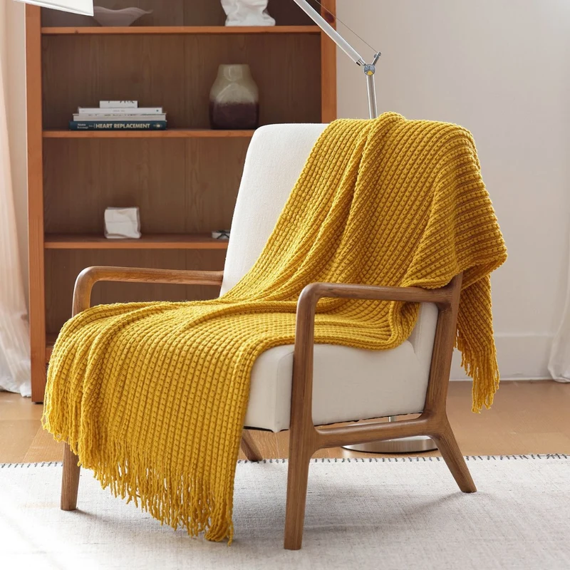 Gemütliche Strickwurfdecke