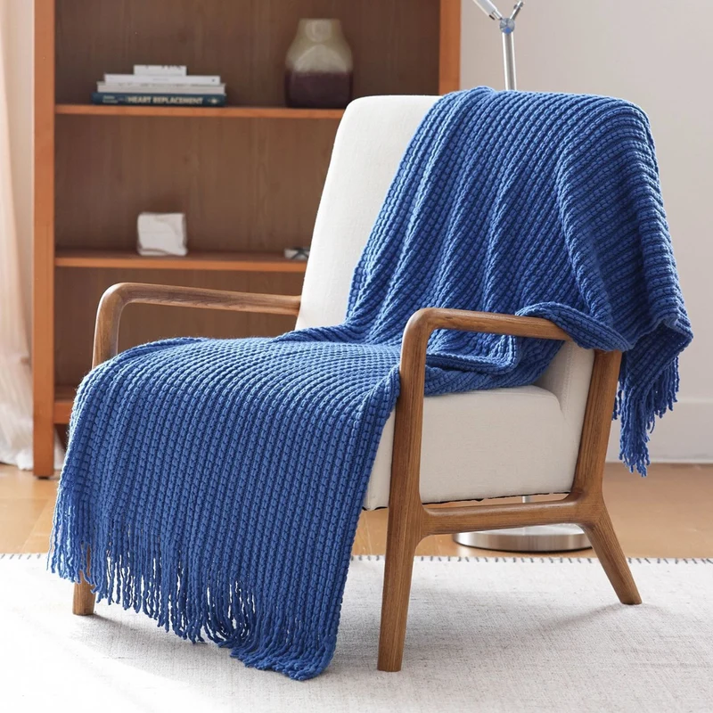 Gemütliche Strickwurfdecke