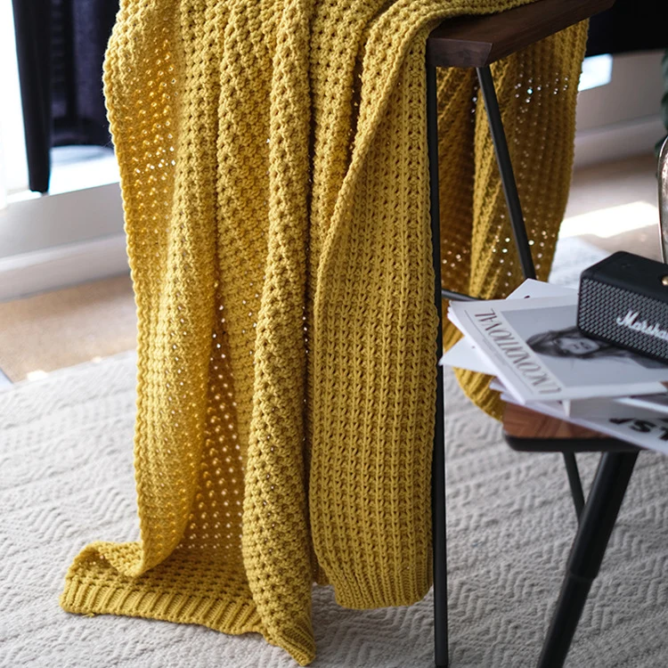 Gemütliche Strickwurfdecke