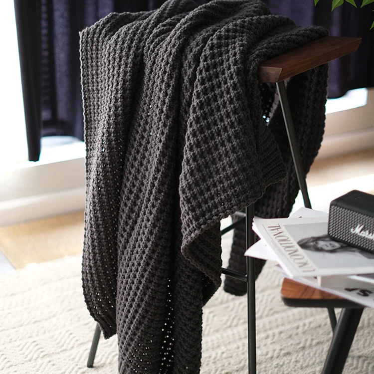 Gemütliche Strickwurfdecke