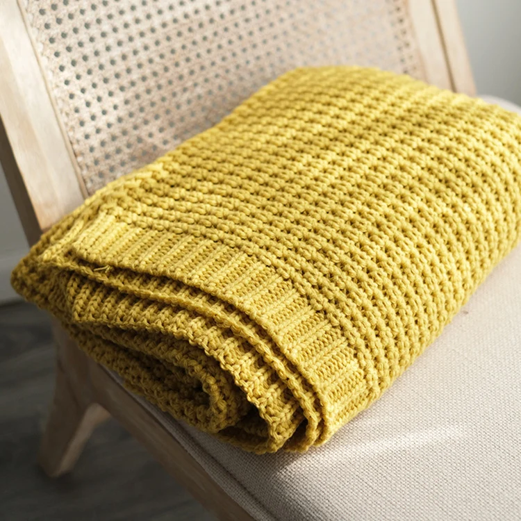 Gemütliche Strickwurfdecke
