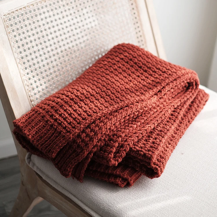 Gemütliche Strickwurfdecke