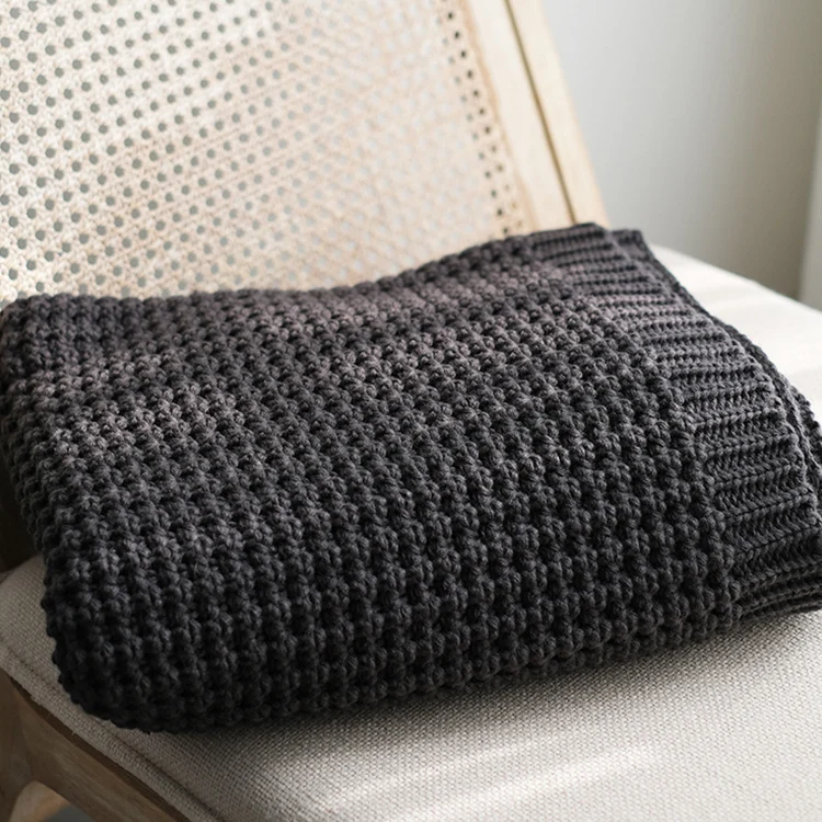Gemütliche Strickwurfdecke