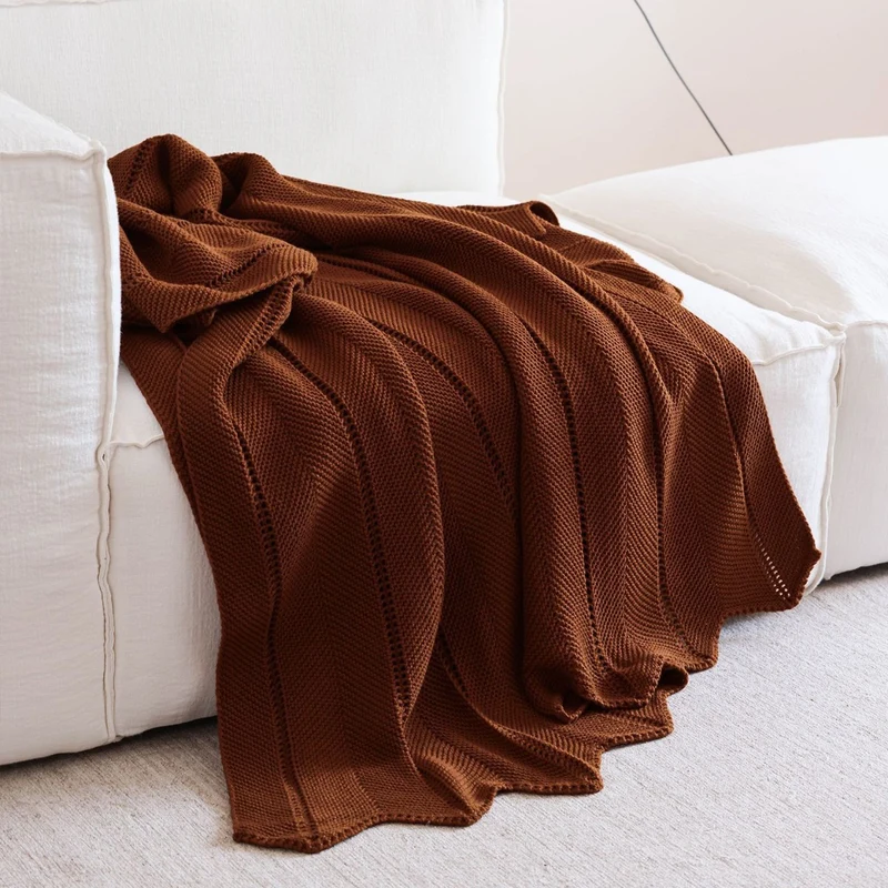 Elegante Strickwurfdecke