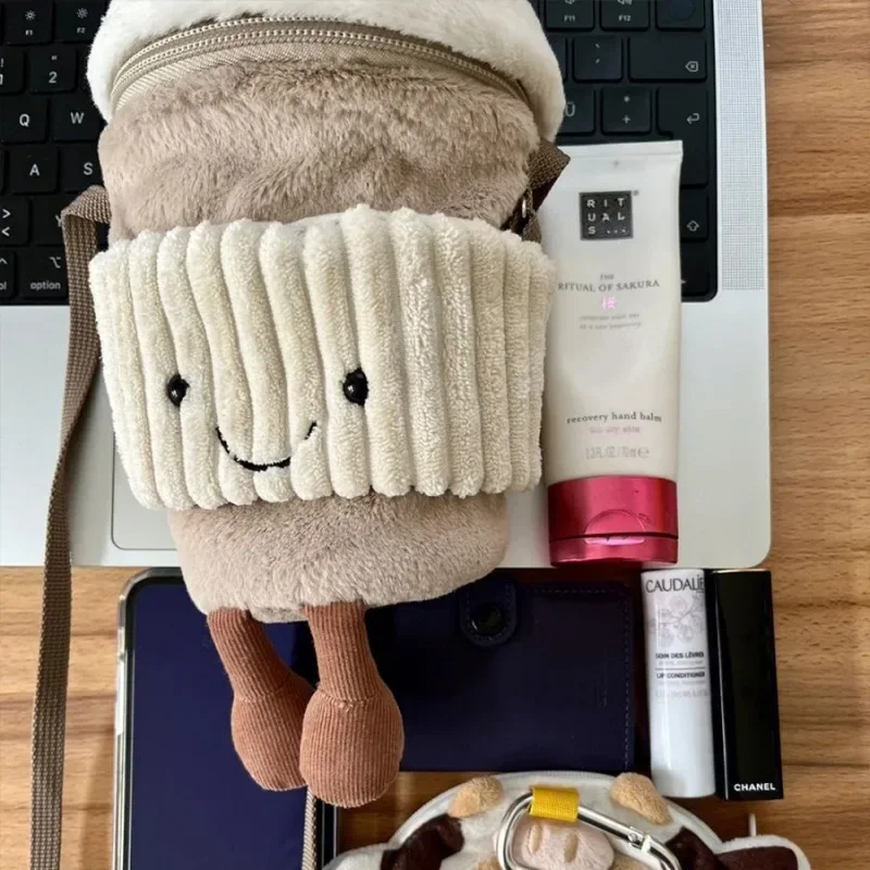 Skanto | Süße Happy Kaffeetassenhalter-Plüschtasche