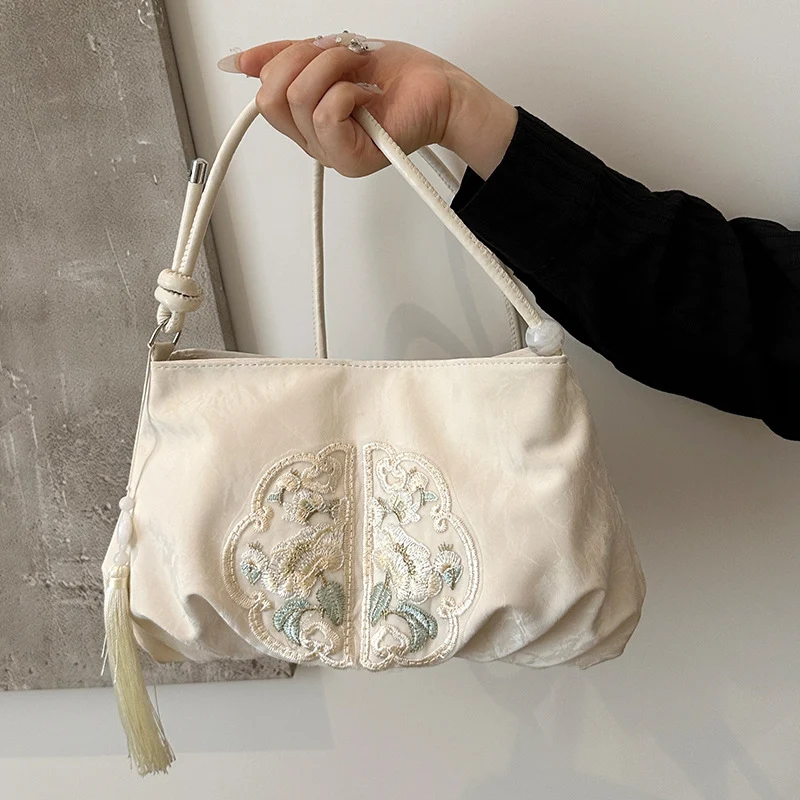 Elegante gestickte Abendhandtasche