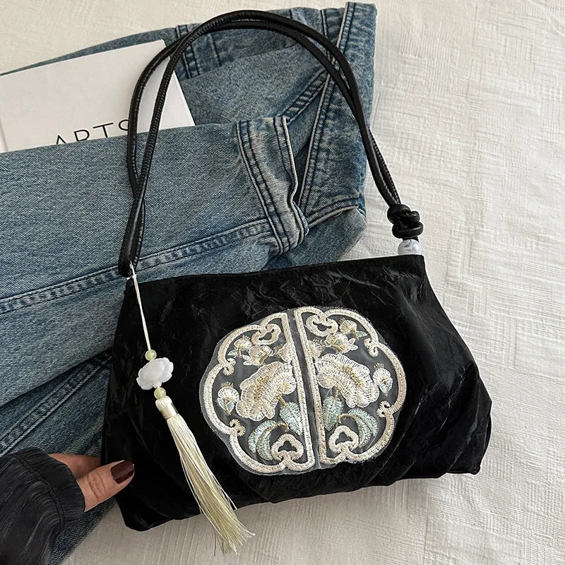 Elegante gestickte Abendhandtasche