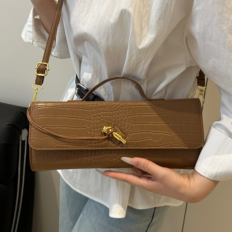 Elegante Handtasche mit Krokodiltextur