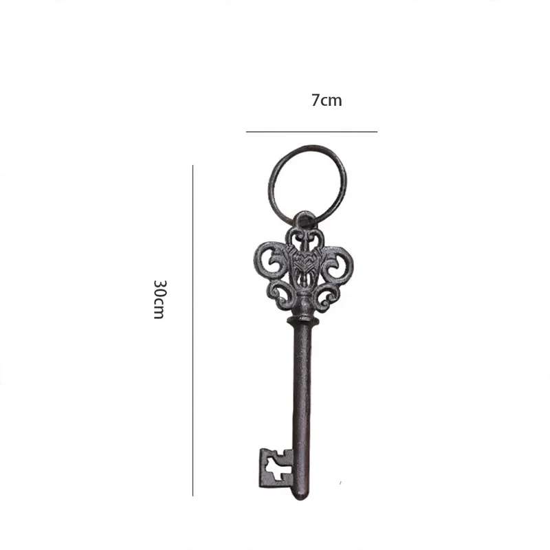 Wandhaken aus Eisen mit Schlüsselmotiven