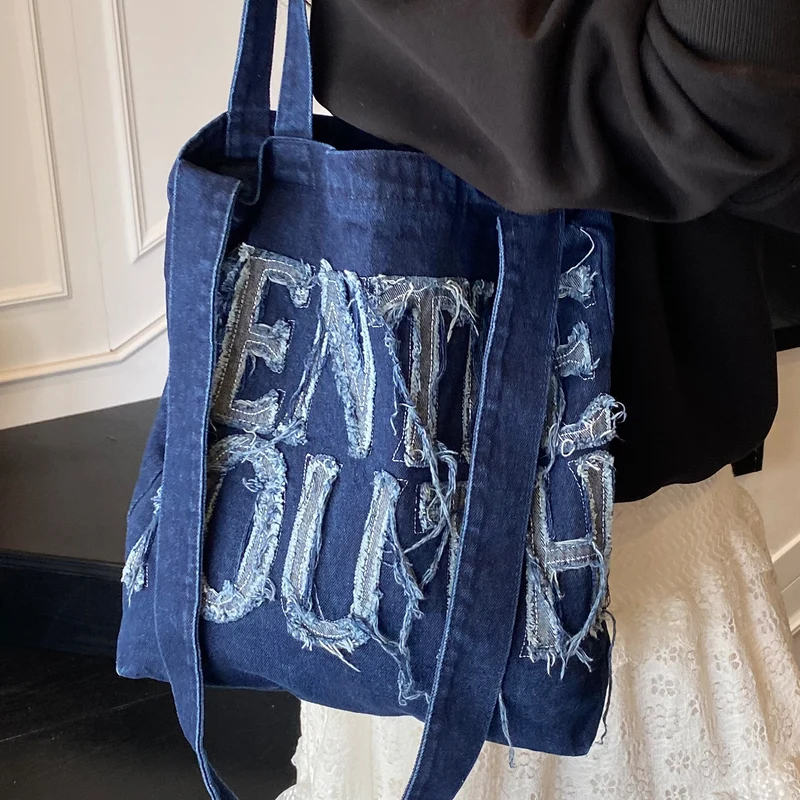 Zerrissene Denim Grafik Tragetasche