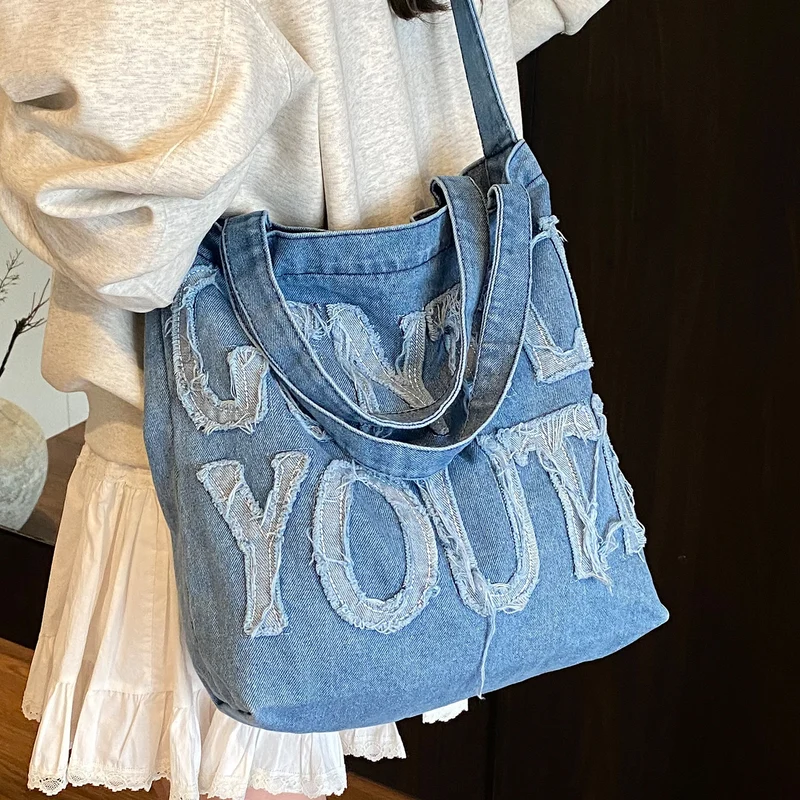 Zerrissene Denim Grafik Tragetasche