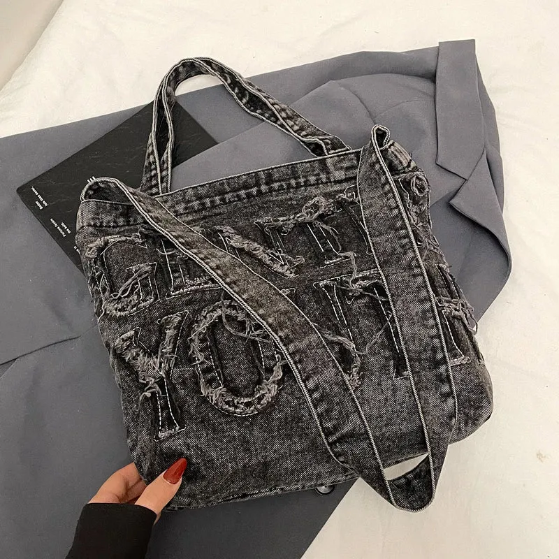 Zerrissene Denim Grafik Tragetasche