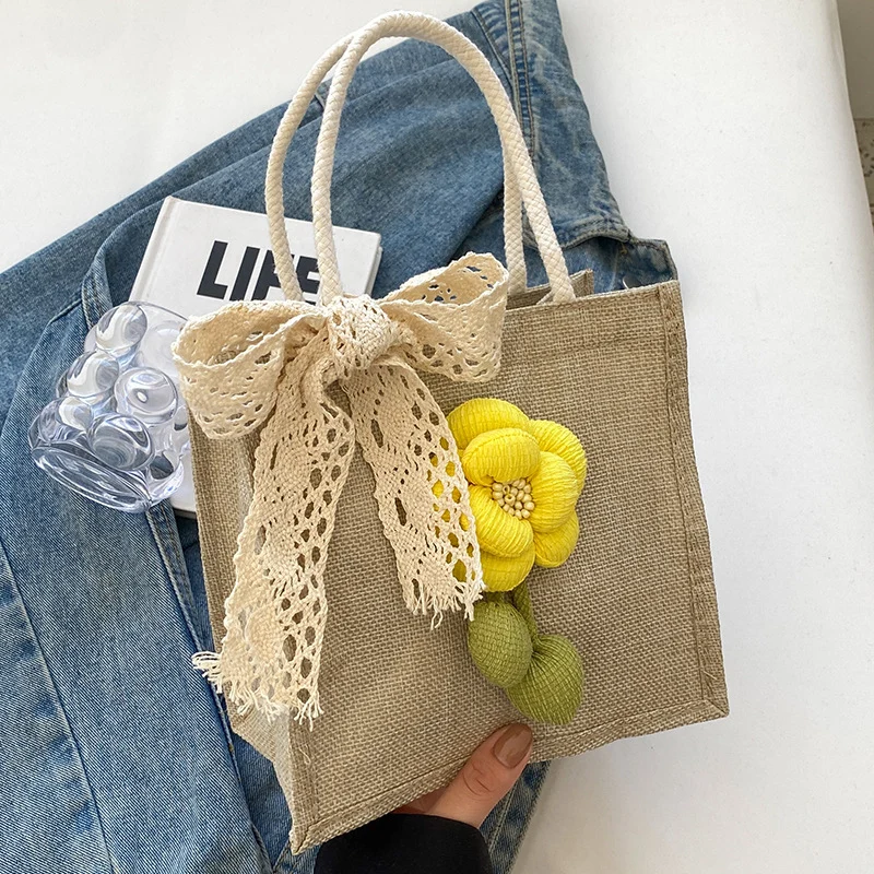 Blumenverzierte Tasche