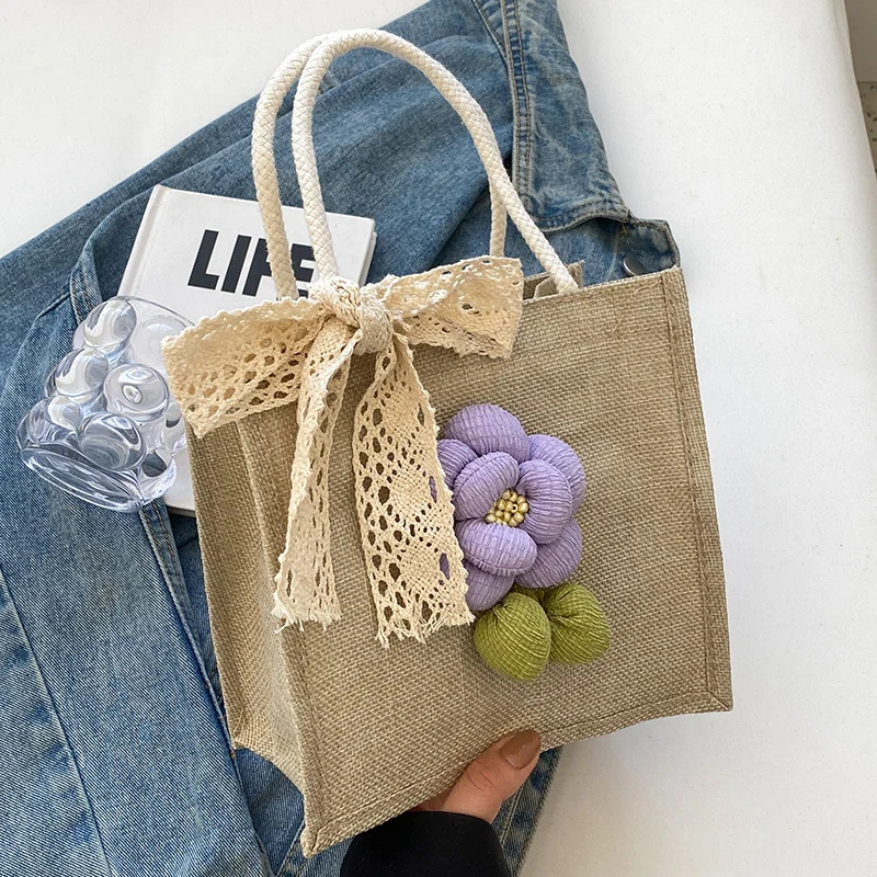 Blumenverzierte Tasche