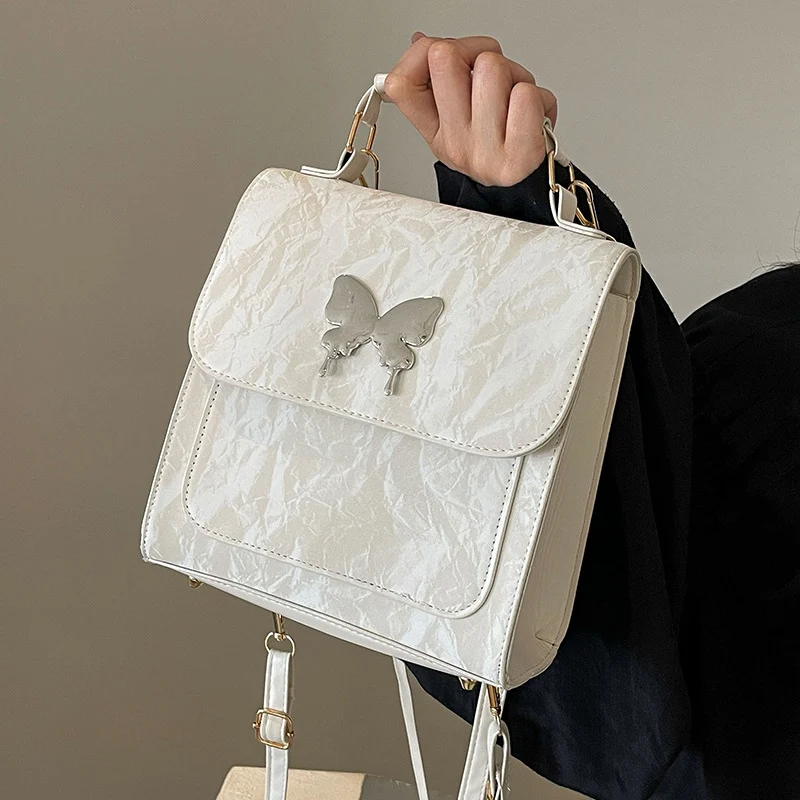 Schmetterlingsverzierte Handtasche