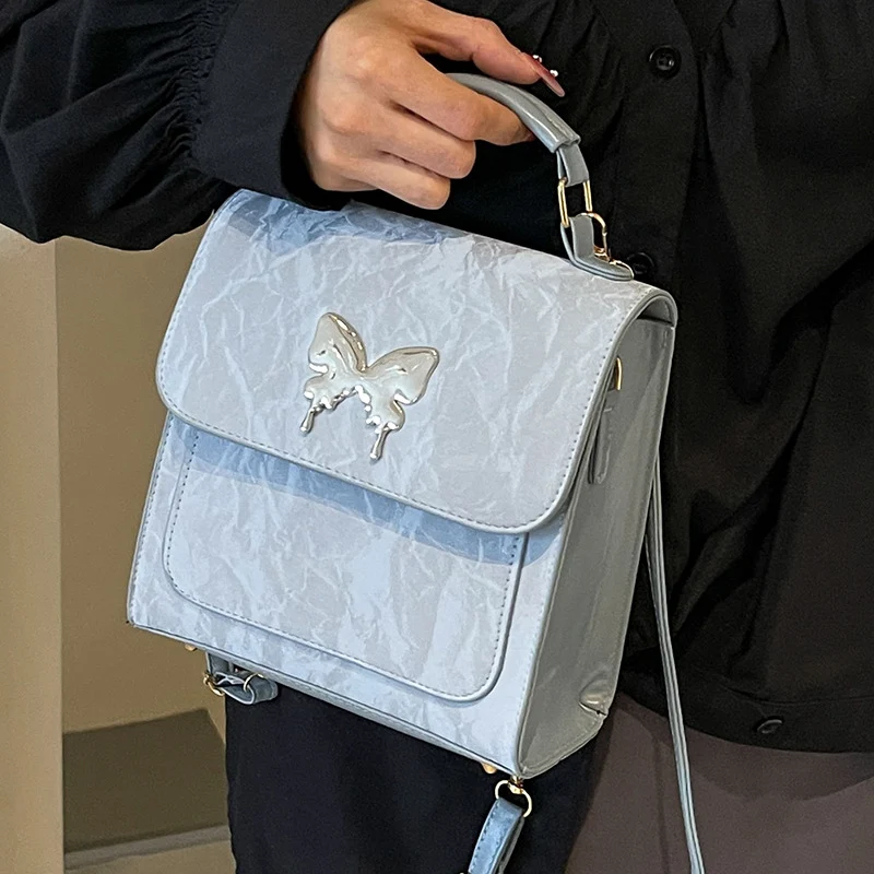 Schmetterlingsverzierte Handtasche