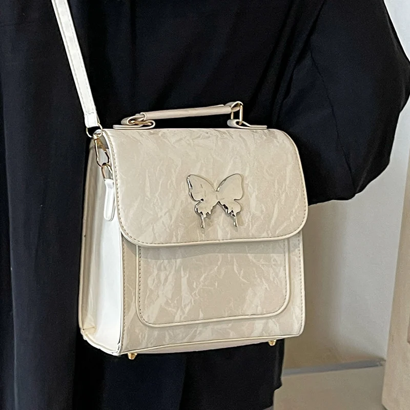 Schmetterlingsverzierte Handtasche