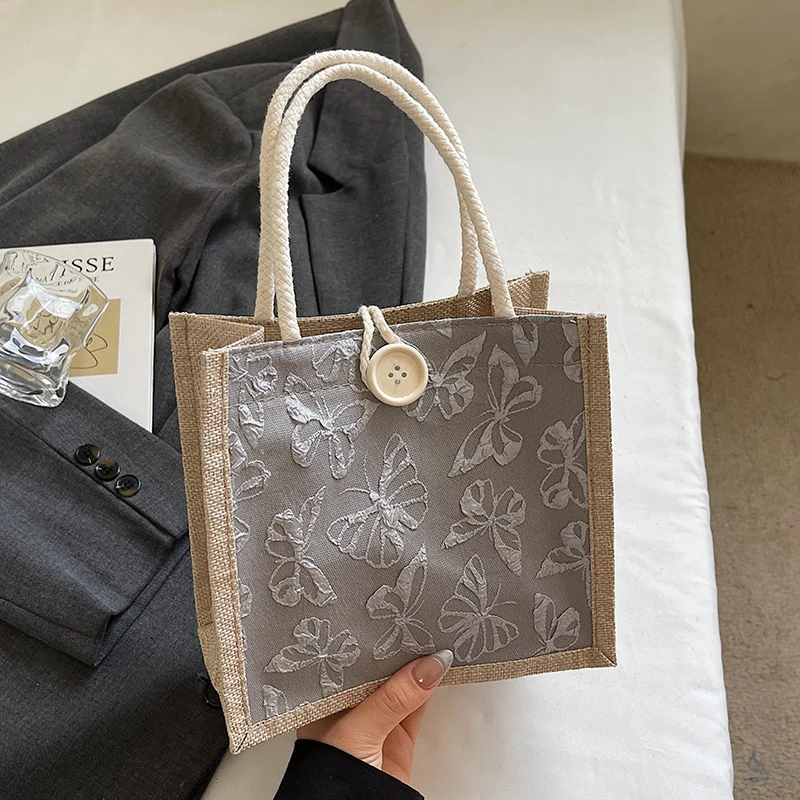Schmetterling bestickte Stofftasche