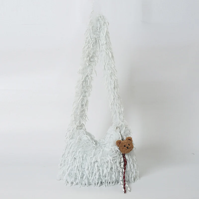 Fluffige Fransenschultertasche