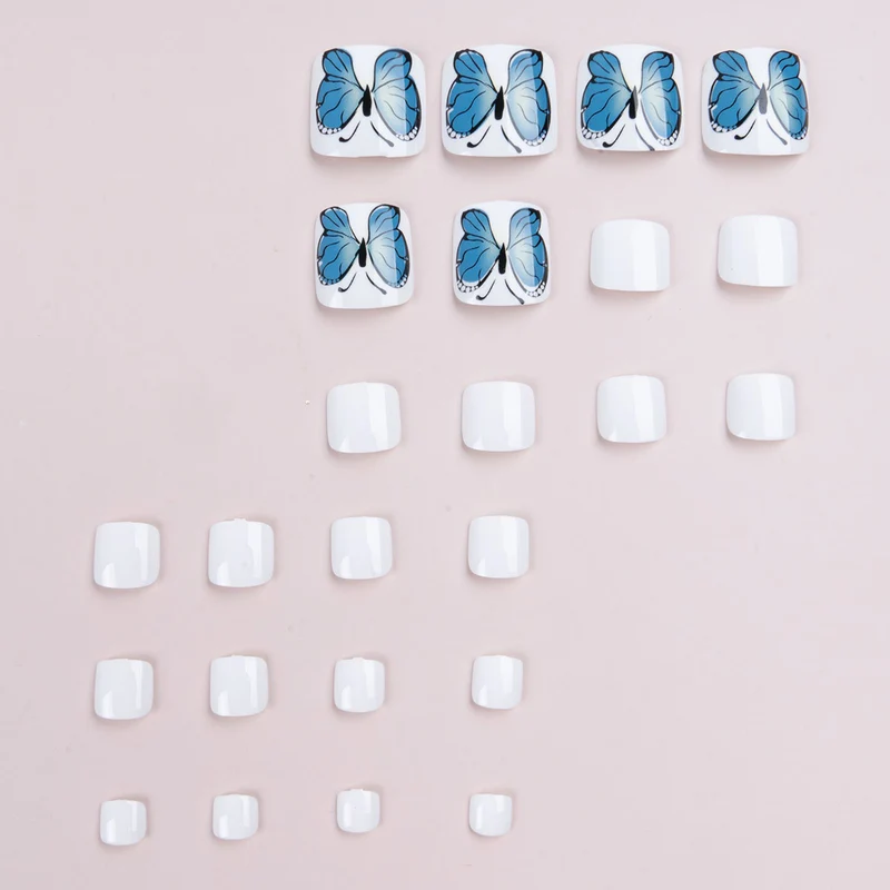 Künstlerische Schmetterlings-Pediküre Nagelkunst