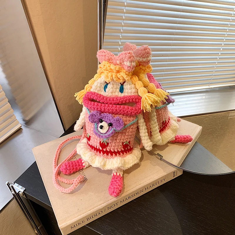 Kreativer Häkelpuppe Rucksack