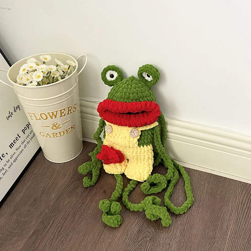 Verspielter frosch-themen gehäkelter rucksack