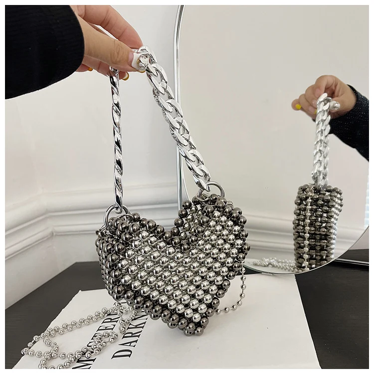 Herzförmige Perlen Handtasche