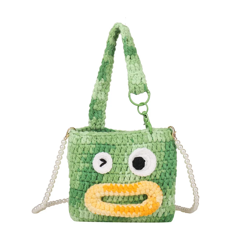 Niedliche gehäkelte Handtasche im Tierdesign