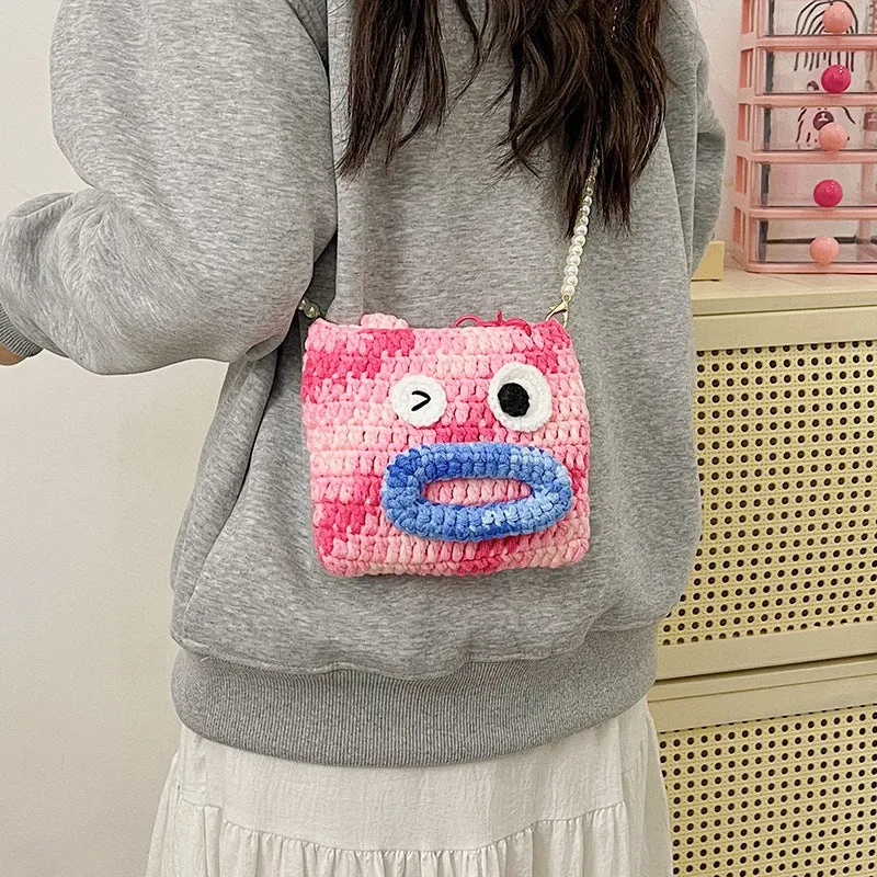 Niedliche gehäkelte Handtasche im Tierdesign