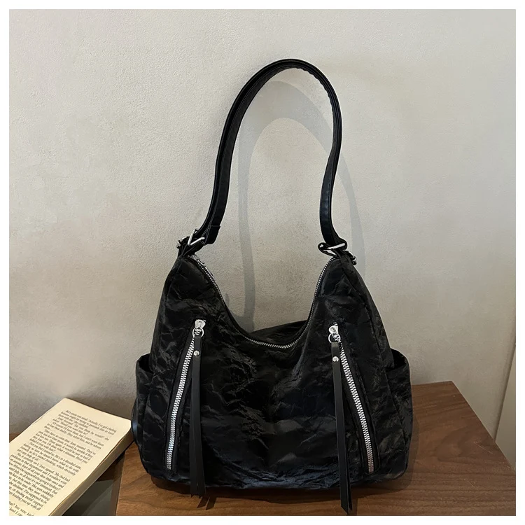Modische gesteppte Handtasche