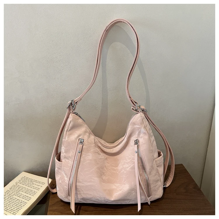 Modische gesteppte Handtasche