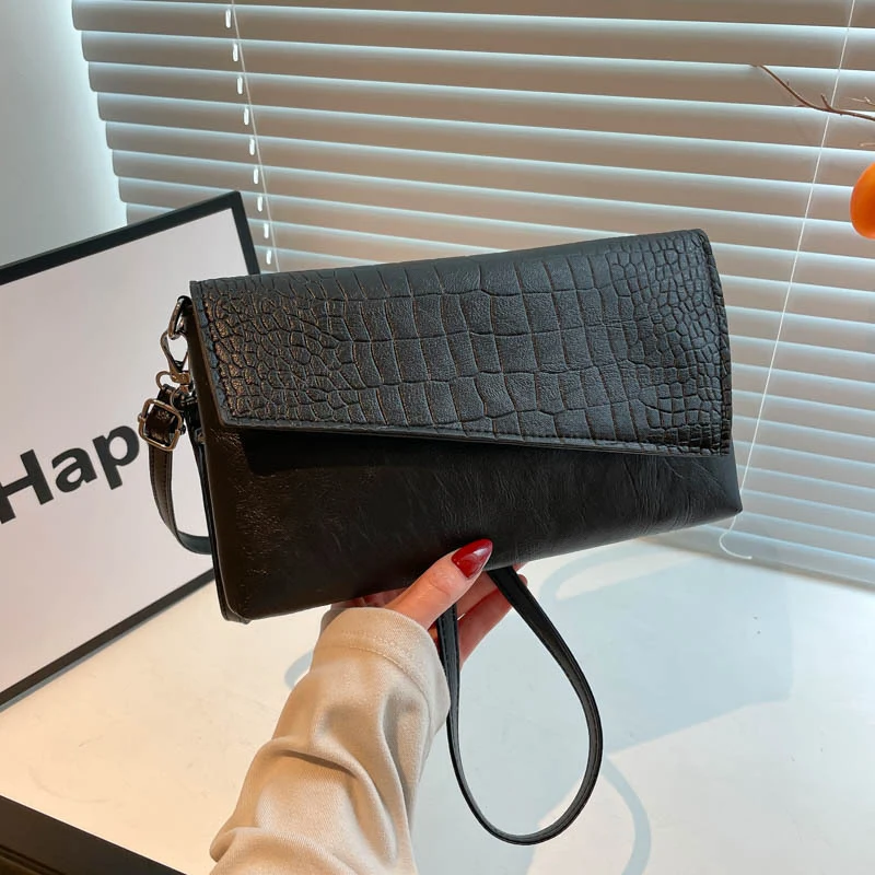 Croc-Prägung Clutch-Handtasche