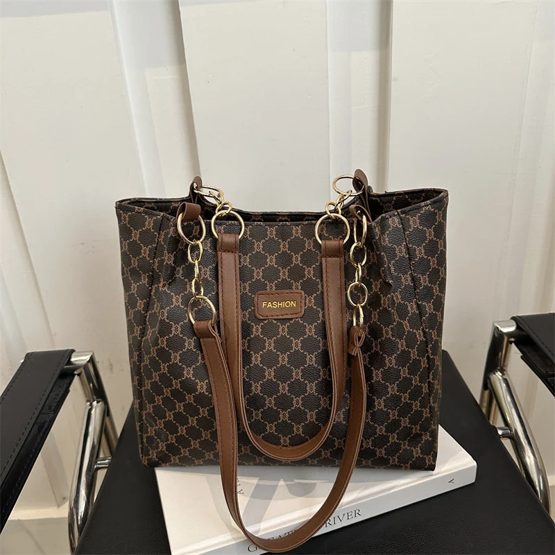 Elegante gemusterte Schultertasche