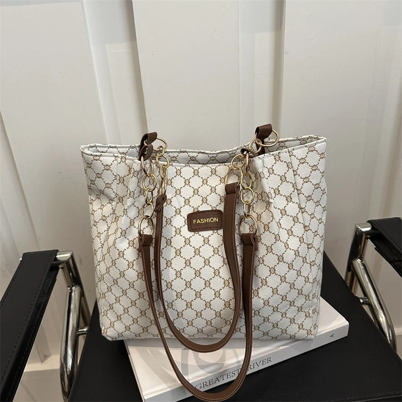 Elegante gemusterte Schultertasche