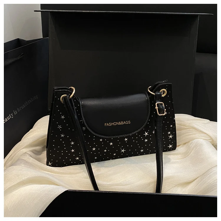 Elegante sternverzierte Umhängetasche