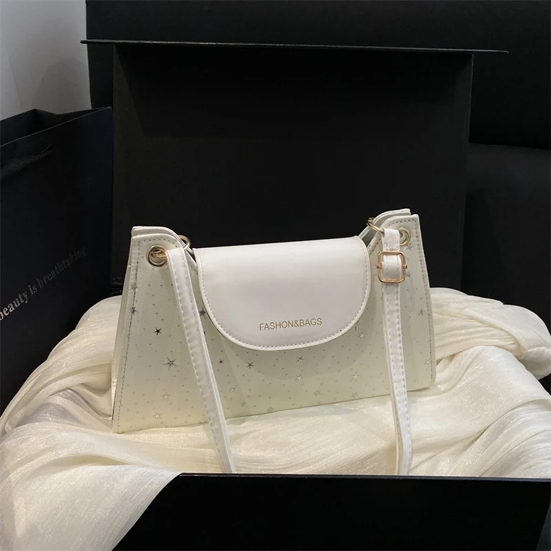 Elegante sternverzierte Umhängetasche