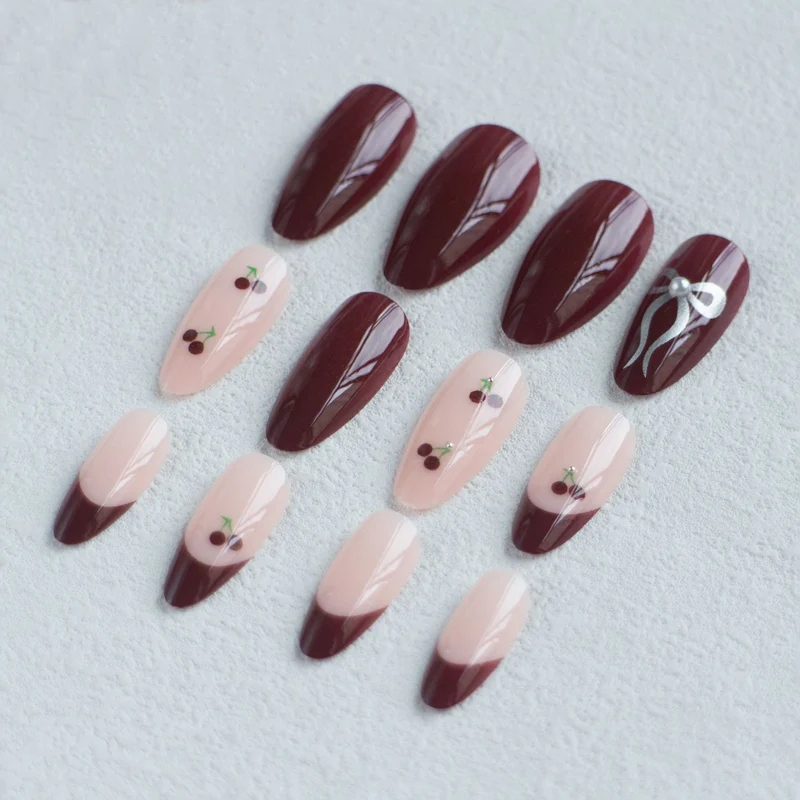 Elegantes Schleifen- und Kirschdesign Nagelkunstset