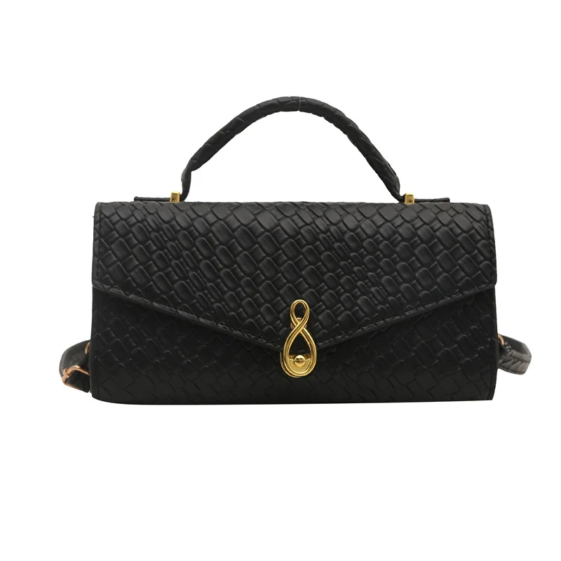 Elegante Handtasche im Krokodil-Muster