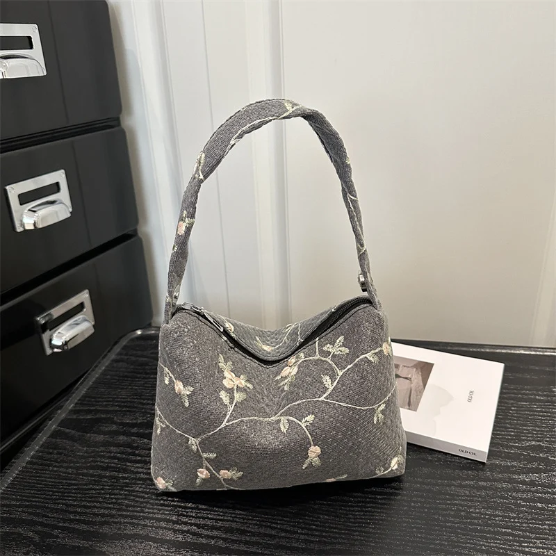 Blumengestickte Handtasche