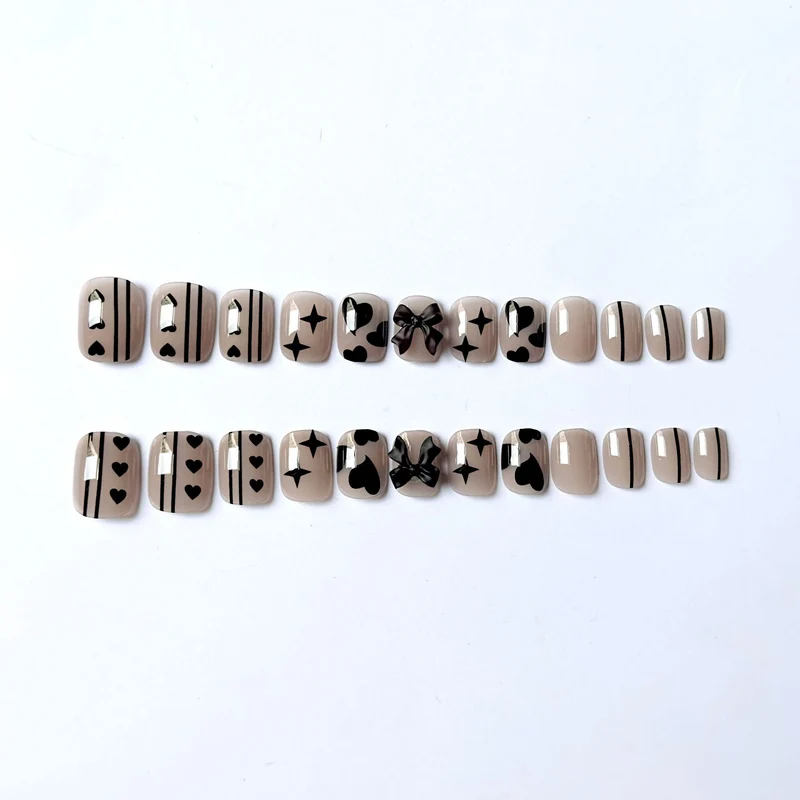 Künstlerisches Nageldesign-Kit mit Schleifenakzenten