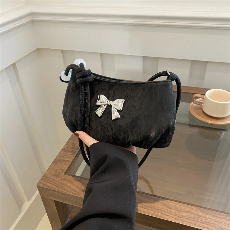 Elegante Tasche mit Schleifendetail