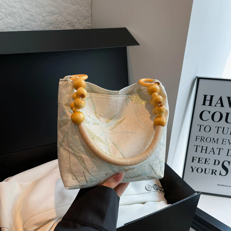 Elegante Handtasche mit Bambusgriff