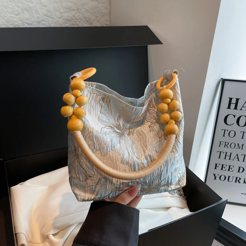Elegante Handtasche mit Bambusgriff