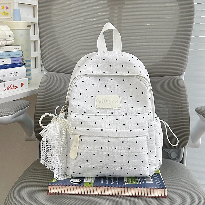 Kompakte Pünktchen Rucksack Karnz