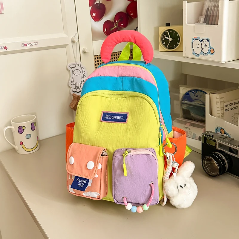 Bunter Mehrfach-Taschen Rucksack Karnz