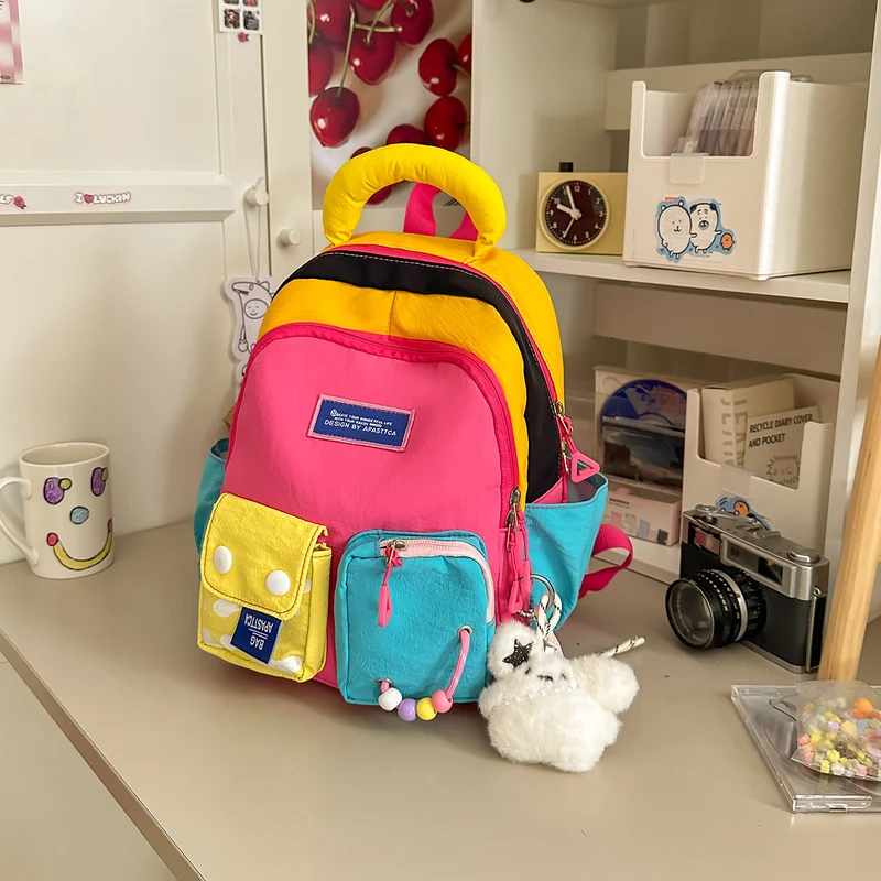 Bunter Mehrfach-Taschen Rucksack Karnz