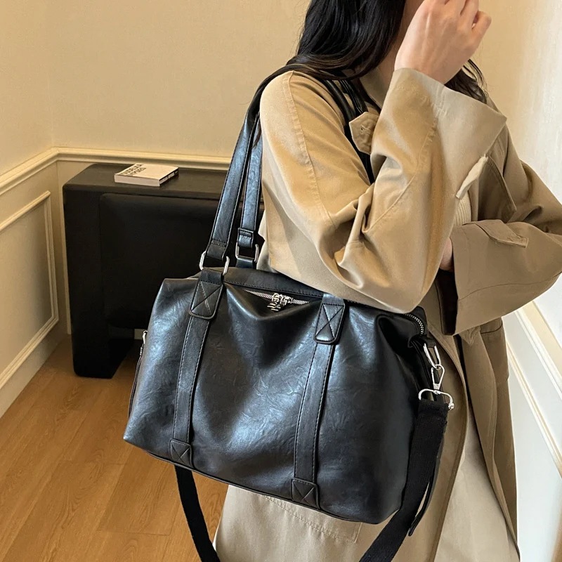 Elegante und stilvolle Tragetasche mit abnehmbaren Schultergurten Skanto