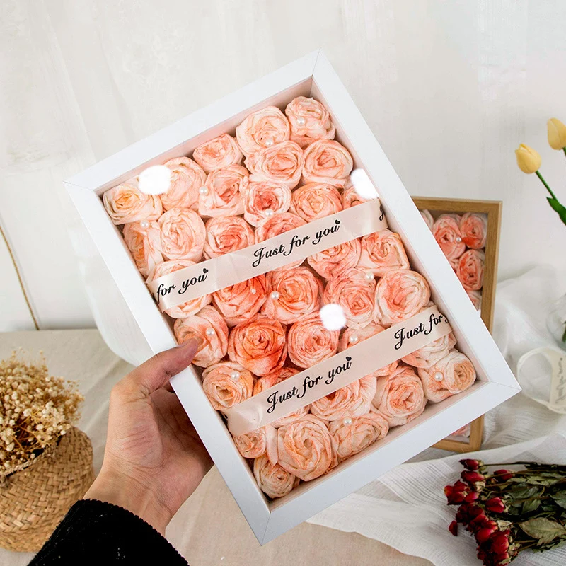 Dekorative Blumen Schattenbox
