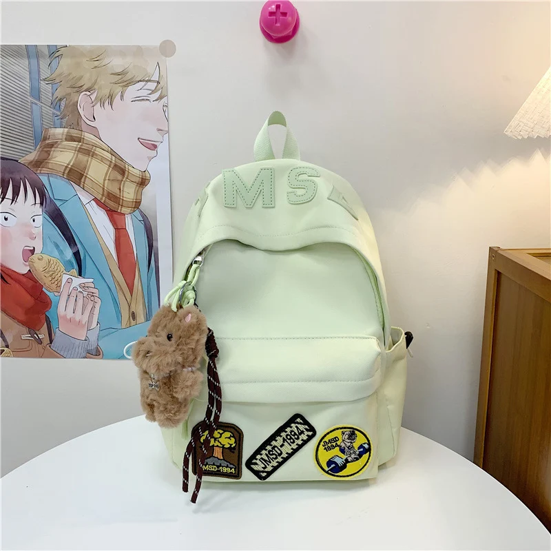 Lustiger Schulrucksack im Themen-Patchwork-Design