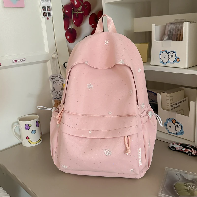 Lustiger Schulrucksack mit Themen-Verzierungen